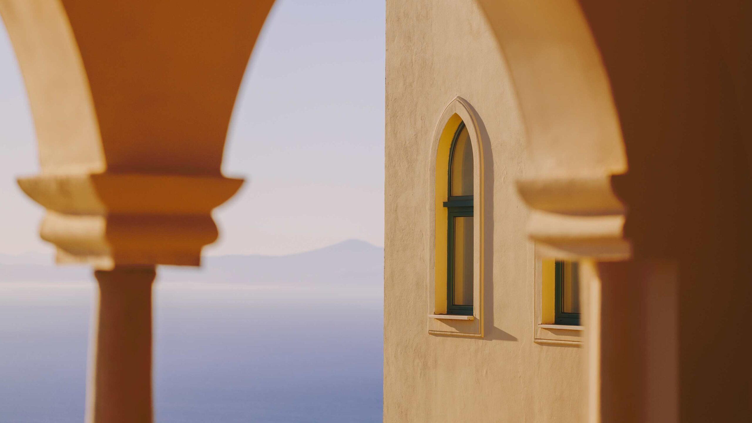 Arched loggia of the palace against the sea, Belmond Hotel Caruso