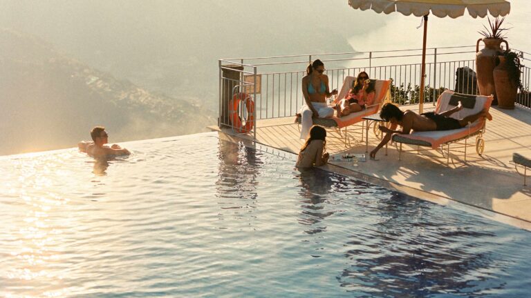 Guests around the infinity pool, Belmond Hotel Caruso