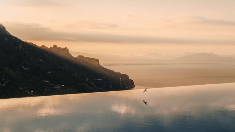 Infinity pool edge at golden hour, Belmond Hotel Caruso