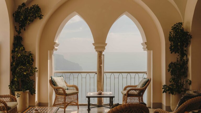 Terrace bar loggia with wicker chairs and sea view, Belmond Hotel Caruso