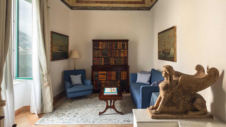Superior suite sitting room with library, Belmond Hotel Caruso