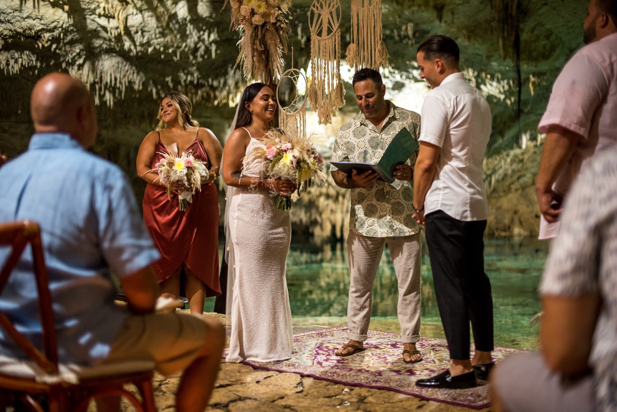 Couple and witnesses at a legal ceremony inside a cenote cave, Better Together Mexico