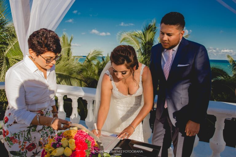 Signing the marriage certificate on a seafront terrace, Better Together Mexico