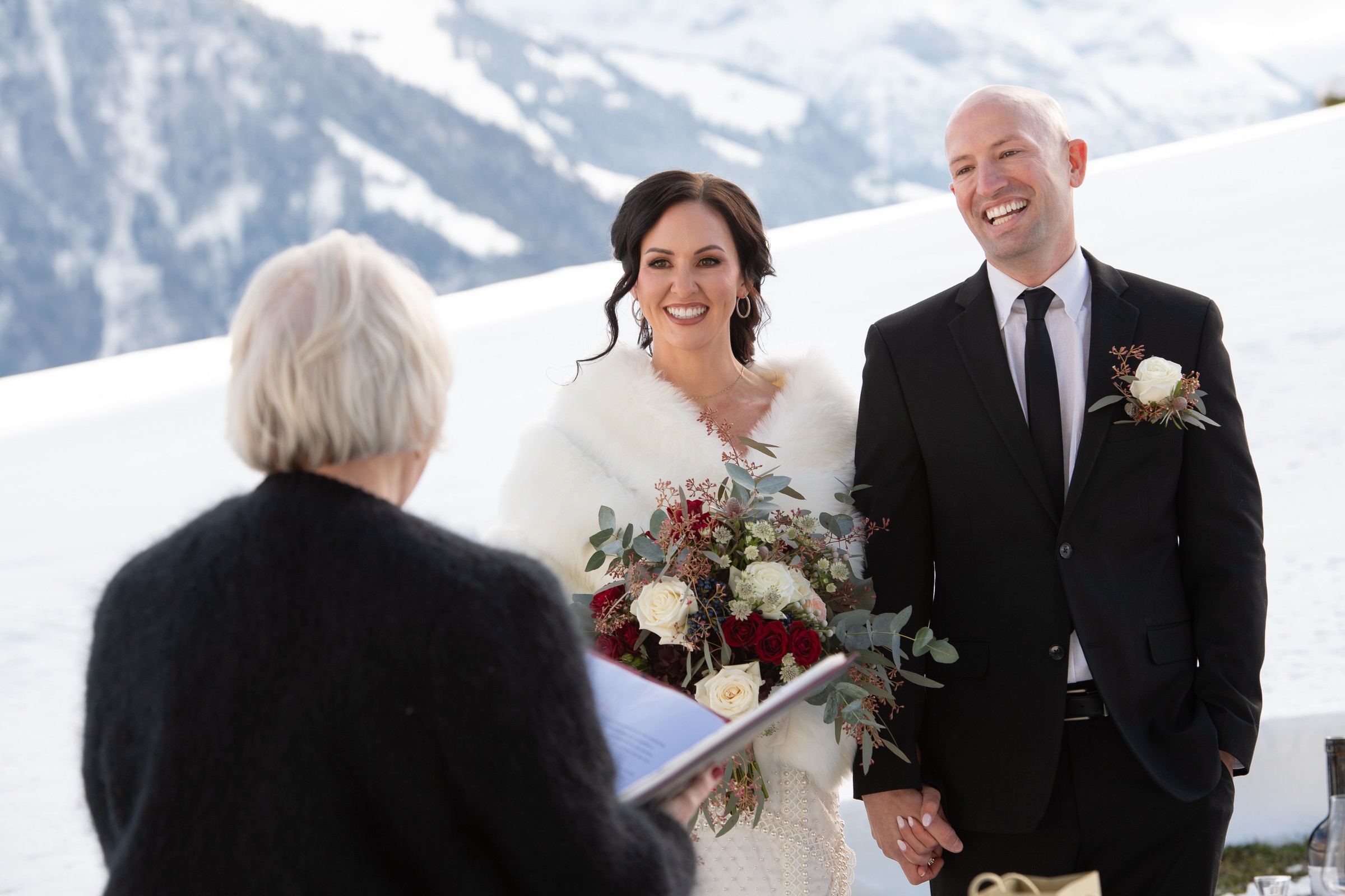 Celebrant leading a snowy winter ceremony above Lake Lucerne, Villa Honegg, Bilingual Celebrant in Europe