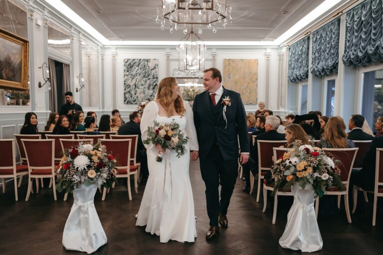 Couple walking back along the aisle after the ceremony, Chateau Gutsch, Bilingual Celebrant in Europe