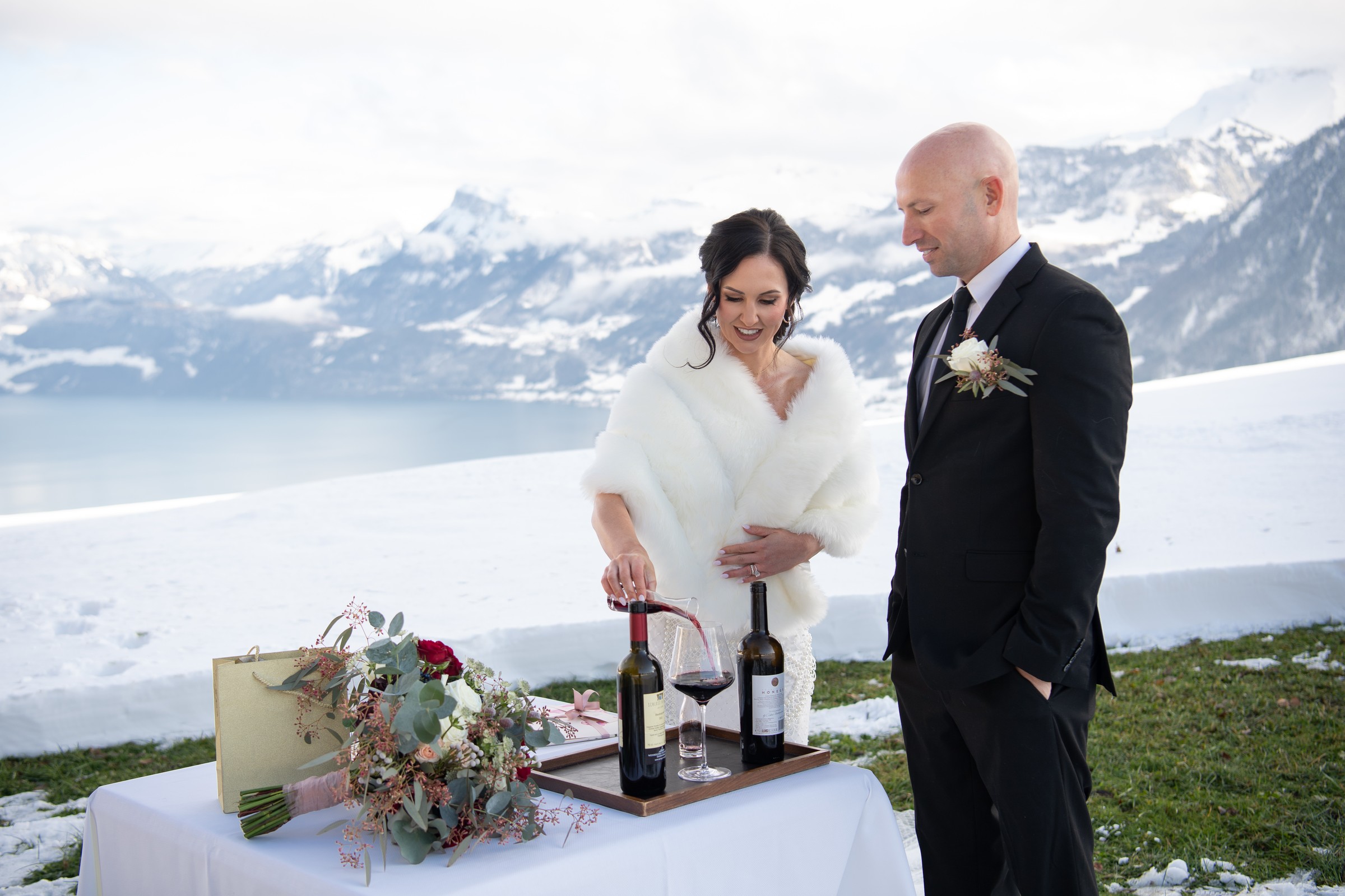 Wine blending ritual table in the snow, Villa Honegg, Bilingual Celebrant in Europe
