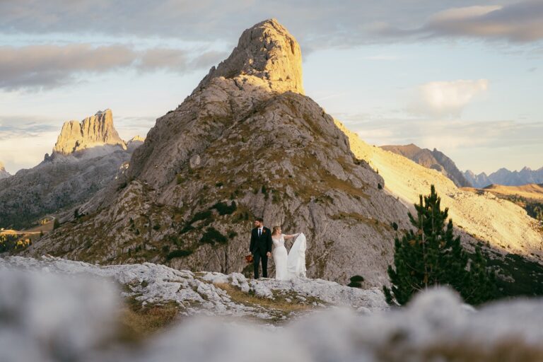 Couple among the rock peaks on a mountain elopement, Bilingual Celebrant in Europe