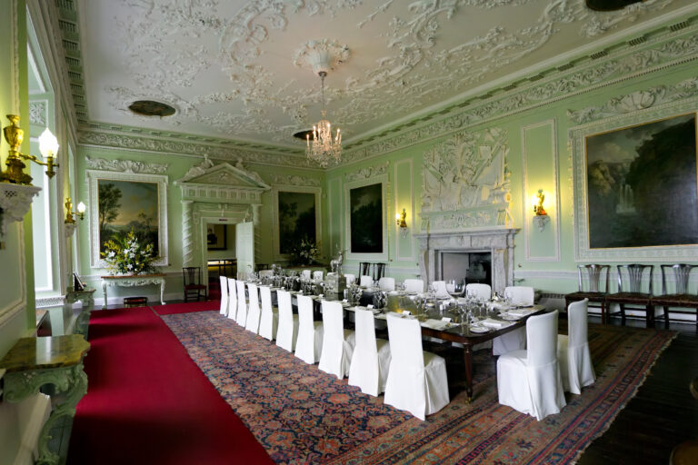 The State Dining Room laid with a long table under Georgian plasterwork, Blair Castle