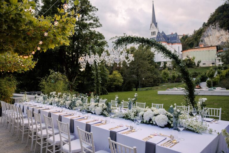 Garden dinner table with the church and castle view, Bled Rose Hotel
