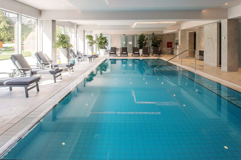 Indoor pool and loungers, Bled Rose Hotel