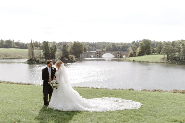 Newlyweds on the lawn by the lake, Blenheim Palace