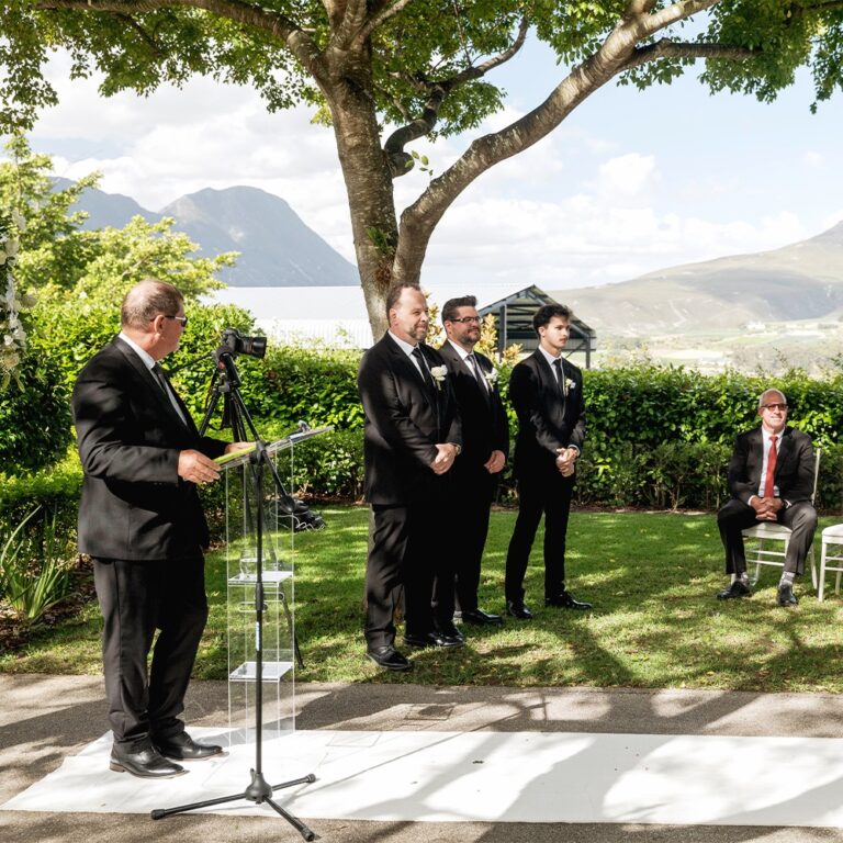 Outdoor ceremony on the lawn with the valley behind, Bona Dea Private Estate
