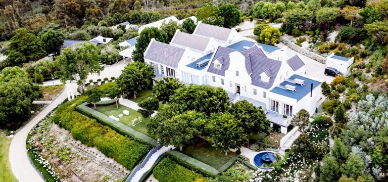 Aerial view of the estate buildings and terraced gardens, Bona Dea Private Estate