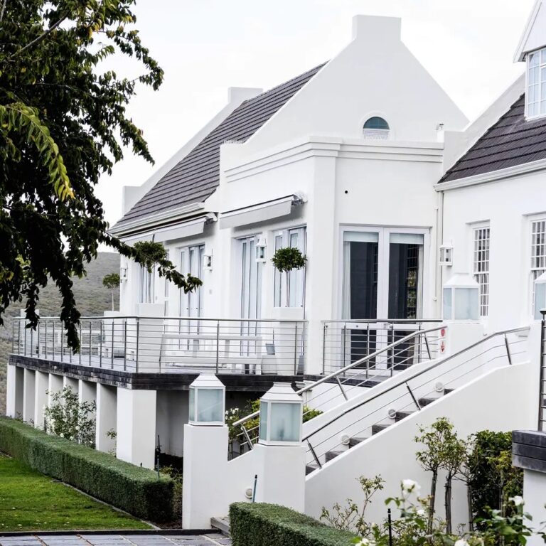White gabled manor house and its stairs, Bona Dea Private Estate