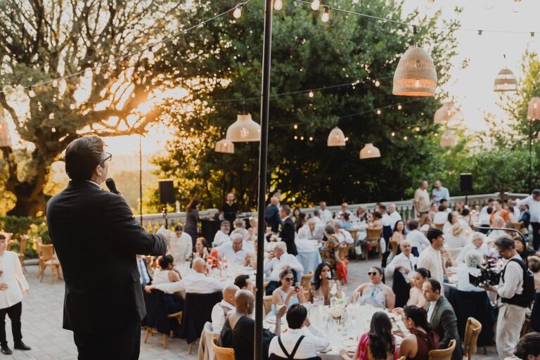 A wedding dinner at sunset in the courtyard, Borgo Bucciano