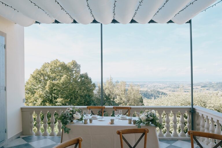 A dressed table on the terrace with the valley view, Borgo Bucciano