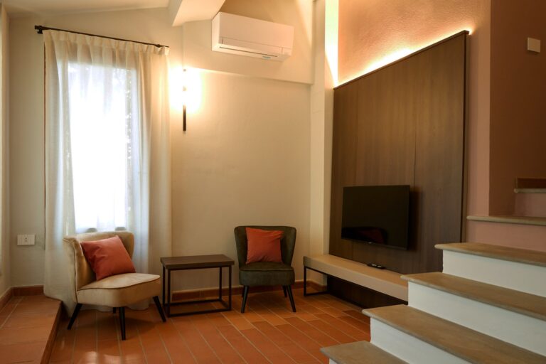 A living area with a staircase in one of the apartments, Borgo Bucciano