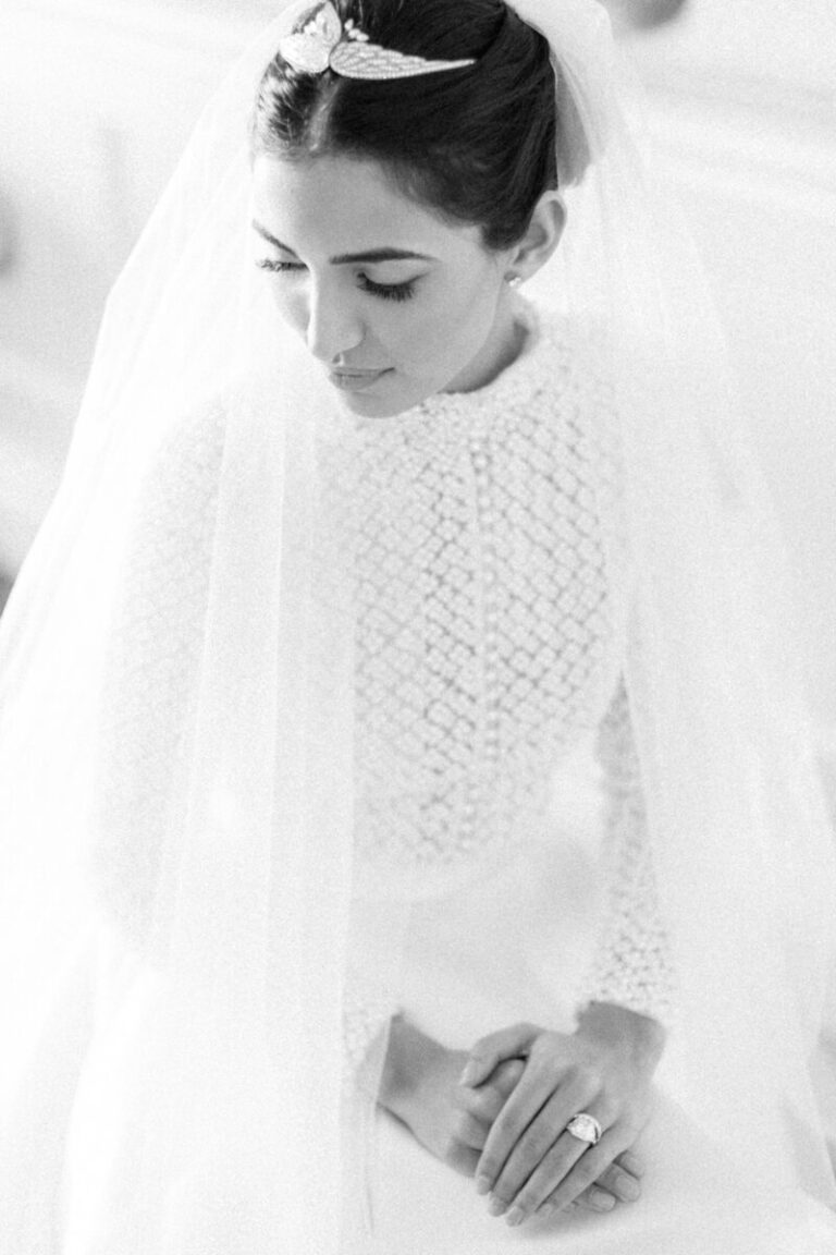 An editorial portrait at Ragley Hall, veil drawn close around the face, Botias