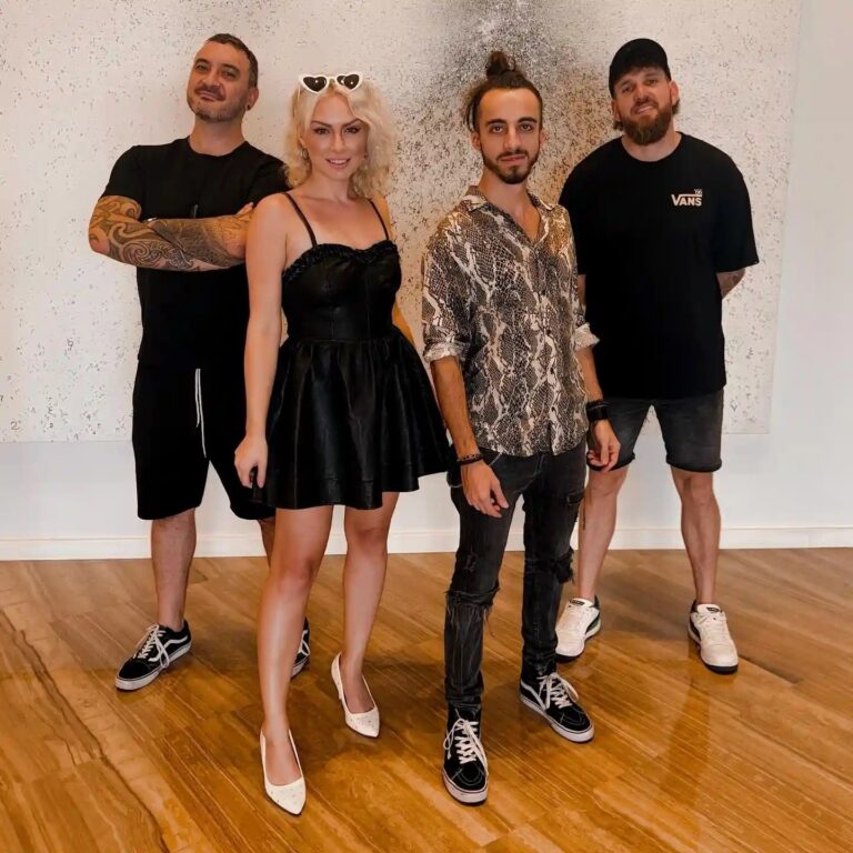 A four-piece live band in a studio pose, Box Entertainment