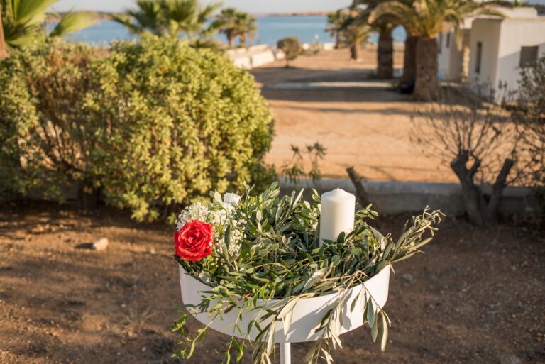 Bridal flower arrangement in a white planter with olive branches, Paros, Bright Blue Wedding And Events