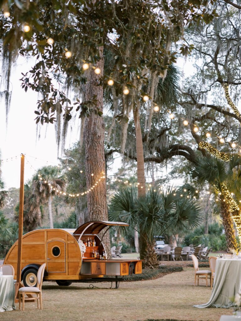 Vintage trailer bar among string lights, Palmetto Bluff, Brilliant Event Planning