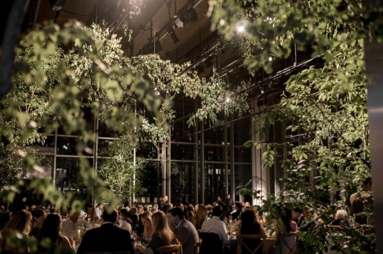 Dinner among hanging greenery in a glass-walled museum, Boston, Brilliant Event Planning