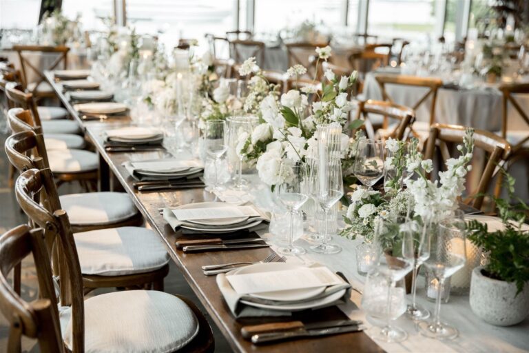 Long table with white flowers and cross-back chairs, Boston, Brilliant Event Planning