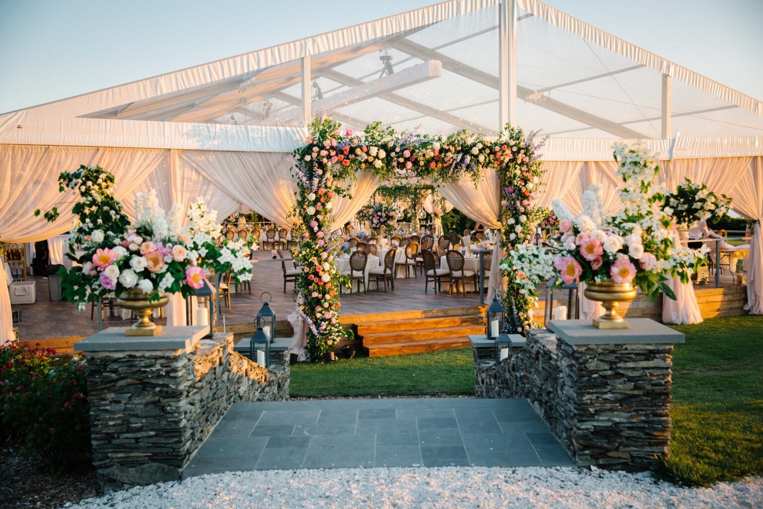 A tented ceremony and reception pavilion on the lawn at Newport, Rhode Island