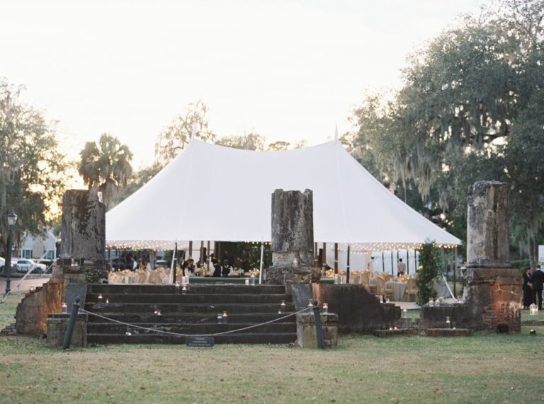 White tent set among live oaks and ruins, Palmetto Bluff, Brilliant Event Planning