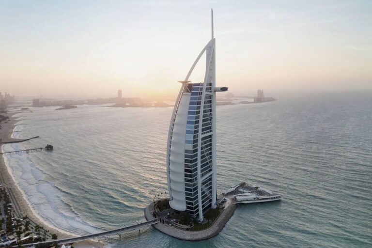 Aerial view of the hotel and its causeway at sunset, Burj Al Arab Jumeirah