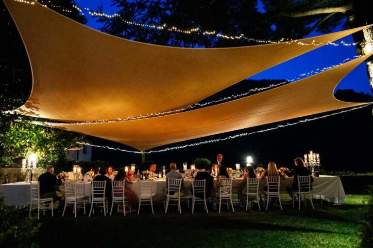 Dinner under lit canopies in the garden, Burlamacchi Villas