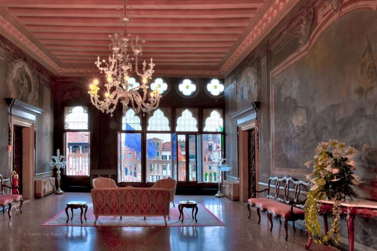 The Portego, a chandelier and Gothic windows opening onto the Grand Canal, Ca' Sagredo Hotel