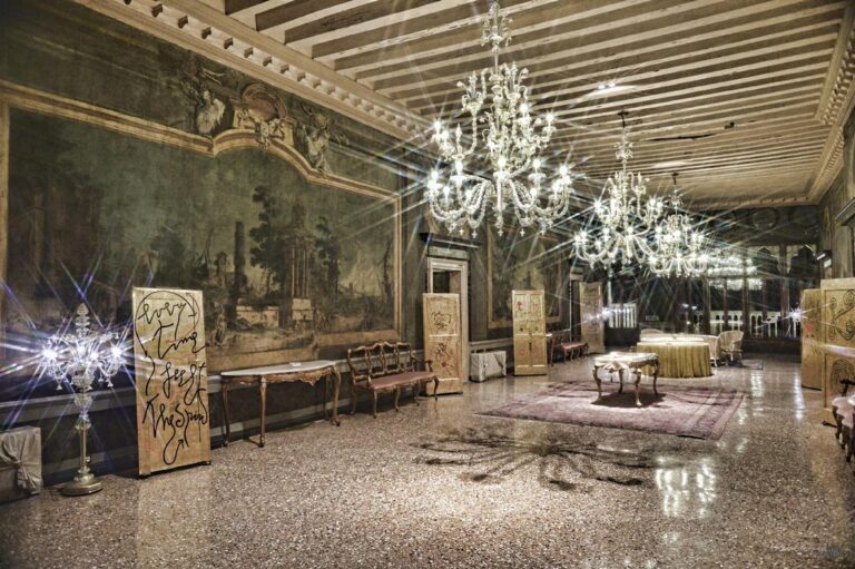 The Portego, its long frescoed wall and chandeliers reflected in the terrazzo floor, Ca' Sagredo Hotel