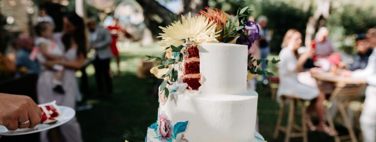 The wedding cake, set with flowers, Can Lluc Boutique Country Hotel
