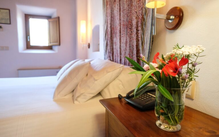 A room set with flowers, Can Lluc Boutique Country Hotel