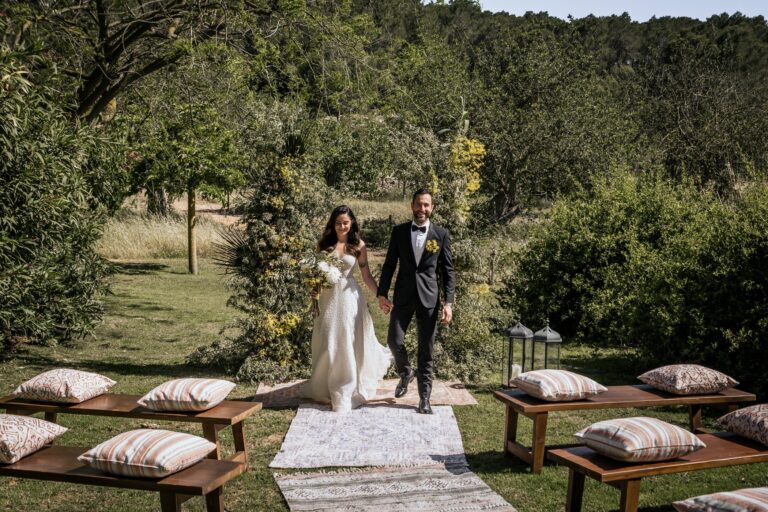 The couple walk the aisle, Can Lluc Hotel