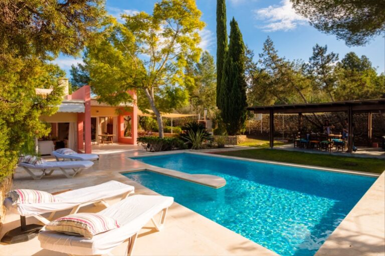 A villa pool in the pine trees, Can Lluc Hotel