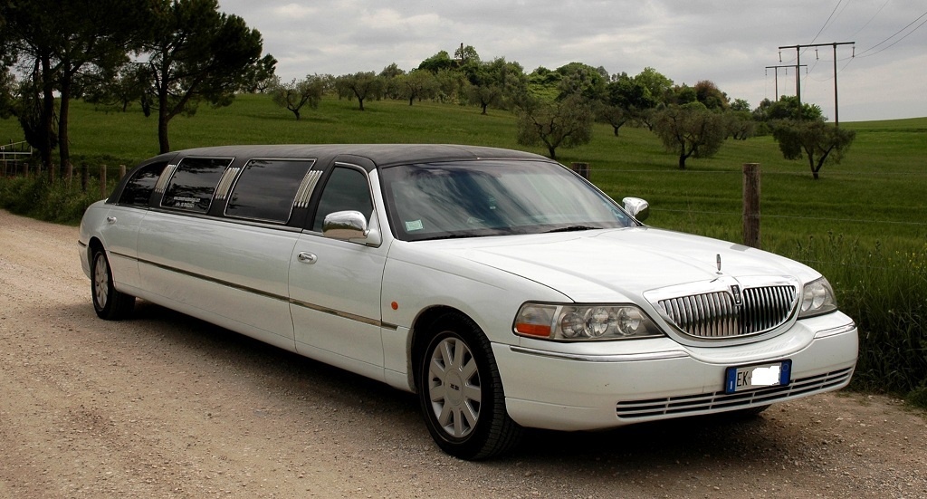 White Lincoln stretch limousine on a country road near Rome, Canestri Autonoleggi, Car Hire Italy
