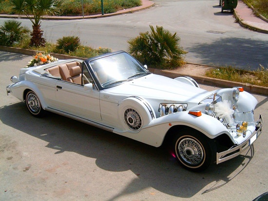 White Excalibur Tiffany cabriolet dressed with flowers, Canestri Autonoleggi, Car Hire Italy