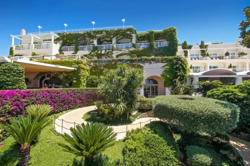 The white hotel building among terraced gardens, Capri Palace Jumeirah