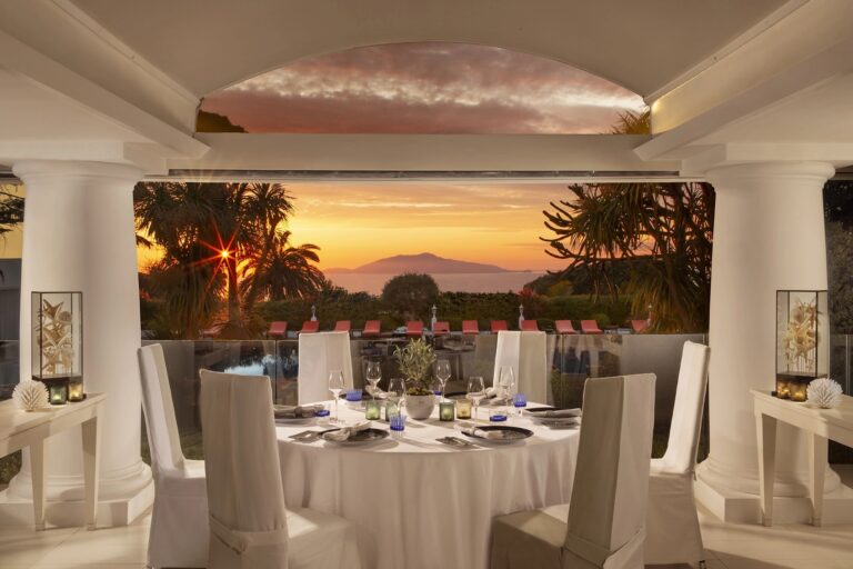 Restaurant tables at sunset, Capri Palace Jumeirah