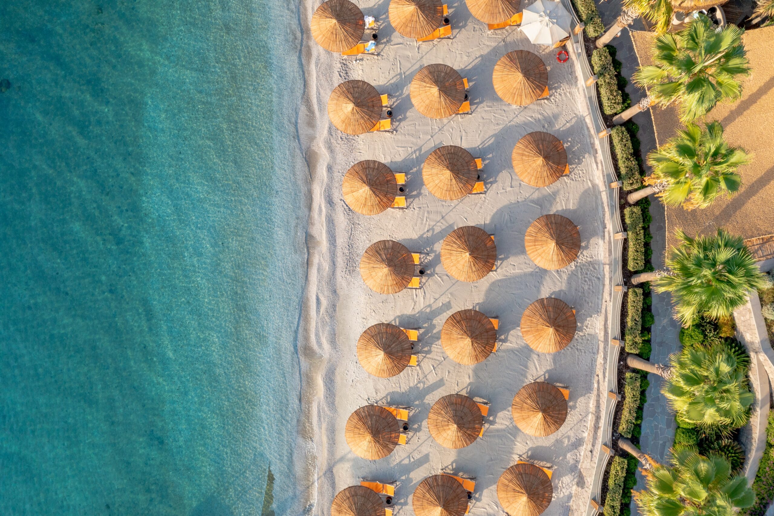 Aerial view of the beach and parasols, Caresse, a Luxury Collection Resort and Spa, Bodrum