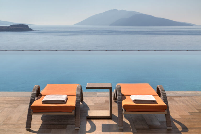 Pool loungers with sea view, Caresse, a Luxury Collection Resort and Spa, Bodrum