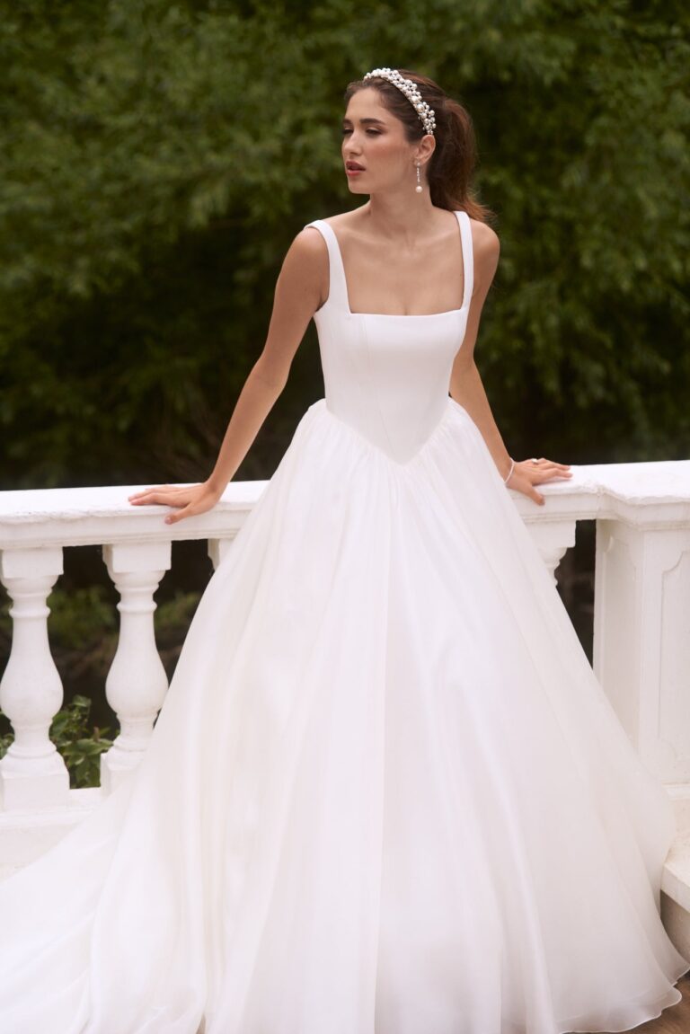The C'est Magnifique gown on a balustraded terrace, Caroline Castigliano