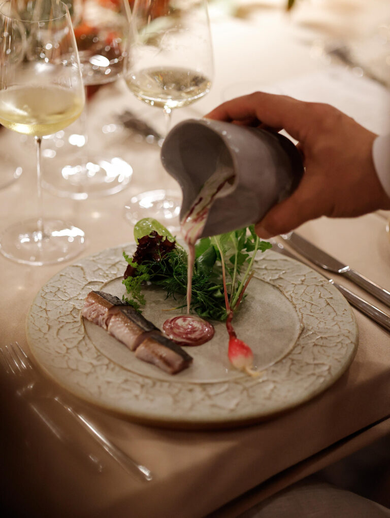 A plated dish having sauce poured at the table, Casa Lavanda