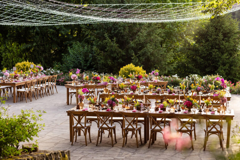 Long reception tables laid on the garden terrace, Casa Lavanda