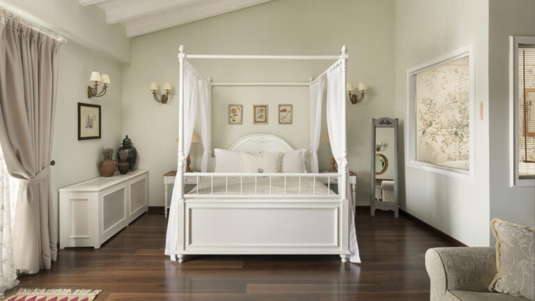 A guest room with a white canopy bed, Casa Lavanda
