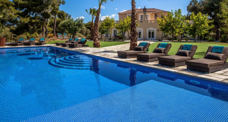 The pool, the palms and the Garraf hills, Casa Nova Estate