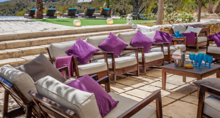 The terrace at dusk, set for the evening, Casa Nova Estate