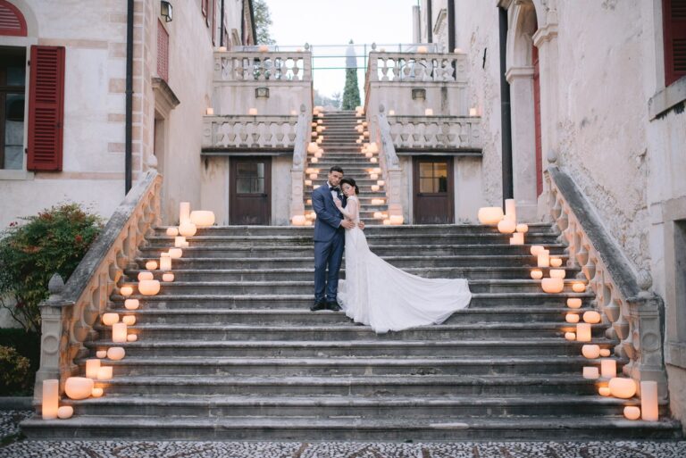 A couple on the candlelit staircase, Castel Brando